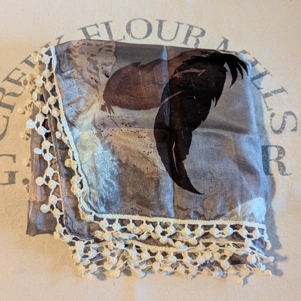 Silk scarf with embroidered edging